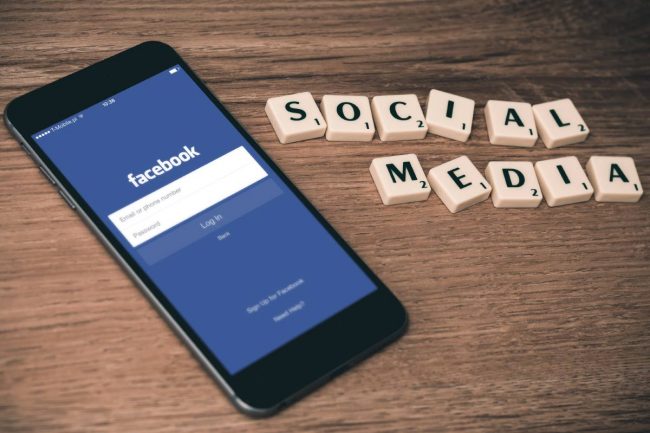 Facebook login on phone, social media.